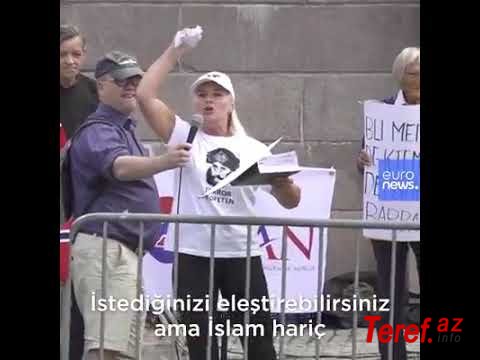 Norveçdəki İslam əleyhinə qrup parlament binası qarşısında Quran səhifələrini yırtdı VİDEO