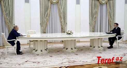 Putin-Makron görüşündə uzun masa müzakirələrə səbəb oldu: "Siz tərəfdə hava necədir?"